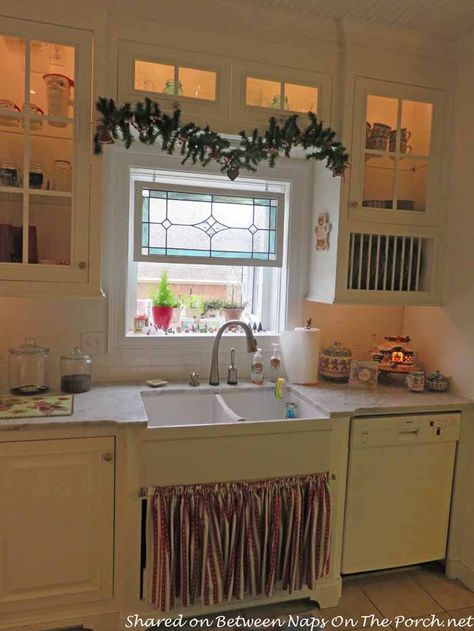 Farmhouse Kitchen Renovation With A Big Chill Refrigerator - Stained glass panel hangs above sink in a remodeled kitchen. Farmhouse Kitchen Renovation, Above Kitchen Sink, Above Sink, Hanging Stained Glass, Kitchen Windows, Window Stained, Farmhouse Kitchen Cabinets, Big Chill, Stained Glass Panel