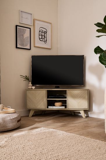 Dark Anderson Oak Effect Corner TV Stand Tv Stand Corner Living Room, Tv Corner Decor, Corner Tv Living Room Layout Couch, Cosy Tv Corner, Corner Tv Stand Styling, Corner Tv Styling, Corner Tv Stand Bedroom, Corner Tv Unit Living Room, Tv Stand In Corner Of Living Room