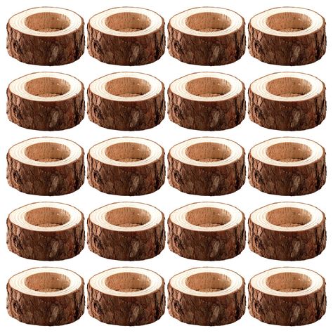 PRICES MAY VARY. You will get 20 pack wood tealight candle holders in bulk. Dimensions approx: dia: 2.36 inch (6 cm), height: 1 inch (2.5 cm); Cavity dia: 1.57 inch (4 cm), height: 0.59'' (1.5 cm). Natural wooden tree stump candle holder, unique appearance creates a romantic and elegant ambience Quality nature pine wood slabs are cut and polished finely with nature rings, smooth and flat. Note: Some wood barks may partially fall from the wood slices You can put tea lights in them and they worked Tree Stump Candle Holder, Candle Holder Wood, Wood Tea Light Holder, Pillar Candle Stand, Electronic Candles, Small Candle Holders, Rustic Candle Holders, Rustic Candles, Tealight Candle Holder