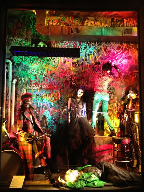 seanslaney:        Created a Downtown Punk Rock Club/Dive Bar, graffiti mural with Daniel Caspera and Space for Bergdorf Goodman “Punk” windows.  Punk and Bergdorf Goodmans?  Too funny! Punk Interior, Nyc Dive Bar Aesthetic, Bar Graffiti Wall Murals, Punk Chaos To Couture, Punk Store, Punk Record Store, Chaos To Couture, Bergdorf Goodman Windows, Punk Decor