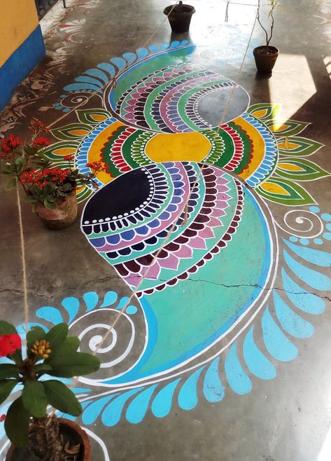 Alpona design using paint Colourful Alpona, Painting Rangoli Design, Fence Painting, House Ceiling, Alpona Design, Fake Glasses, Painted Clothing, Iron Man Art, House Ceiling Design