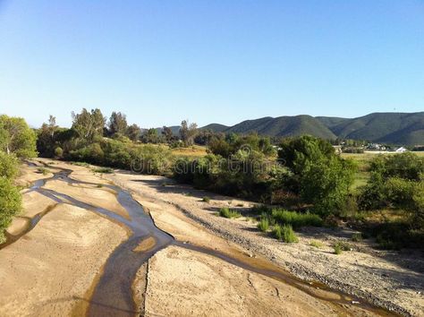 Murrieta California. Murrieta, California. Dry river bed with coastal mountain r , #Ad, #Dry, #river, #Murrieta, #California, #bed #ad Murrieta California, Dry River, River Bed, Mountain Range, California, Beautiful Places, Stock Images, Country Roads, Road