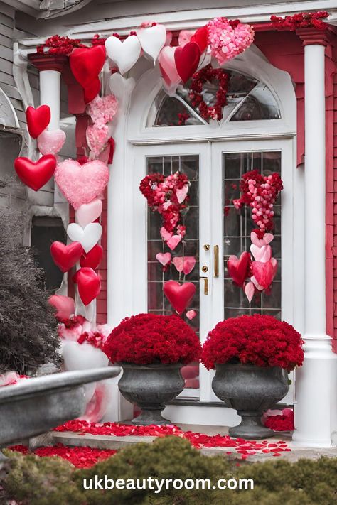 Valentine’s Day decorations offer a great way to infuse your home with a little love and create a warm and romantic ambiance. Whether you’re into DIY projects, heart-shaped wreaths, string lights, or Valentine’s pillows, there are numerous options to consider. This post lists 13 ideas for Valentine’s Day Decorations. Home, party, DIY, bedroom, classroom, easy, St, ideas, farmhouse, boho, work, office. Valentine’s Day Window Decor, Valentines Store Front Windows, Window Displays Retail Store Fronts Valentines Day, February Hearts On Door, Valentines Window Display, Valentine’s Day Floral Installation, Valentines Party Decor, Valentine's Day Decorations, Romantic Ambiance