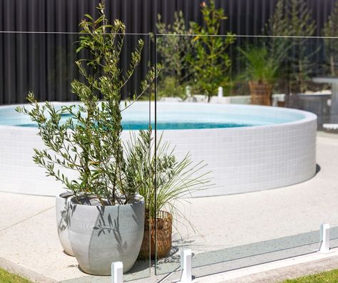 ✨ This backyard renovation is a vision of elegance. Featuring our White Spigots, Custom curved rod fencing, and Frameless Glass pool fencing that harmonise beautifully with the white-tiled plunge pool. 💙🌿 ☎️ Call 1300 71 81 92 to discover white, or many of our other colour pool fencing options. . . . #WhiteDelight #BackyardOasis #PoolsideParadise #poolfencing #curvedpoolfencing #whitehardware #whitespigots Fencing Options, Glass Pool Fencing, Backyard Renovation, Pool Fencing, Glass Pool, Backyard Renovations, Pool Fence, Plunge Pool, Pool Ideas