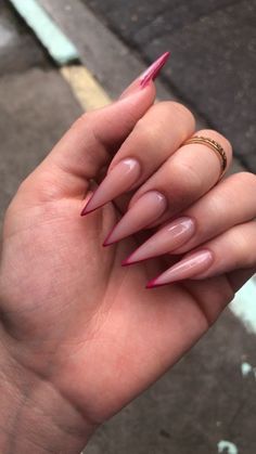 These stiletto-shaped nails offer a daring and sleek look. They feature a glossy nude pink color that transitions smoothly into sharp white tips, creating an elegant and modern take on the classic French manicure. The nails are finished with a shiny top coat for an extra touch of sophistication. Simply stunning!✨ // Photo Credit: Instagram @nailedmyset Sharp French Nails, Stiletto Shaped Nails, Pink French Nails, White Tips, Shaped Nails, Classic French Manicure, White Tip, Cute Nail Designs, Romantic Valentine