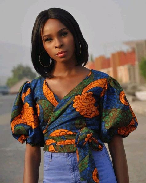 Different Beautiful Ankara Wrap Top Styles Every Lady Can Recreate. | Boombuzz Ankara Crop Tops With Jeans, Ankara Wrap Top Styles, Wrap Top Styles, Ankara Wrap Top, Sequins Jumpsuit, Peplum Pattern, Ankara Crop Top, Corporate Gowns, Peplum Wrap Top