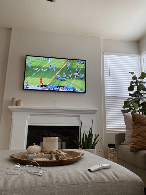 Watching the Chargers game in the living room, featuring neutral decor and the Frame TV. Football House Decor, Watching Football On Tv Aesthetic, Football Sunday Aesthetic, Watching Football Aesthetic, Fall Football Aesthetic, Football Season Aesthetic, Football On Tv, American Football Party, Utah Mom