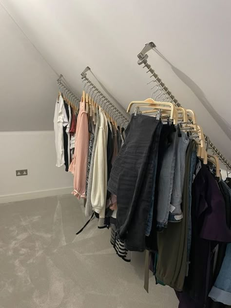 Loft Bedroom Clothes Storage, Angled Clothes Rail, Slanted Ceiling Clothes Rack, Hanging Rails Clothing, Diy Hanging Clothes Rack From Ceiling, Clothing Rail Bedroom, Clothes Rail Ideas, Attic Closet Ideas Angled Ceilings, Clothes Rail Bedroom