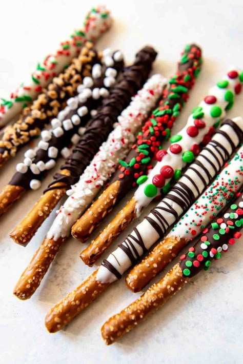 Chocolate Covered Pretzel Rods Chocolate Covered Pretzels Christmas, Chocolate Pretzel Rods, Dipped Pretzel Rods, Christmas Pretzels, Covered Pretzel Rods, Dipped Pretzels, Chocolate Covered Pretzel, Chocolate Covered Pretzel Rods, Easy Holiday Desserts