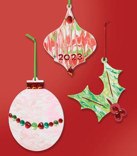 How To Make Shaving Cream Swirl Ornaments Online | JOANN Shaving Cream Ornaments, Swirl Paint Ornaments Diy Christmas, Marbling Ornaments, Diy Marbled Ornaments, Shaving Cream Marble Painting, Prek Christmas, Shaving Cream Painting, Skeleton Decorations, Fabric Wreath