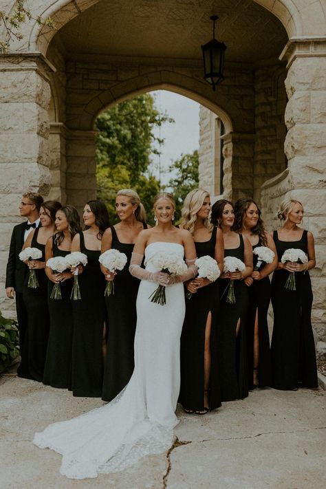 Bride-smiles-as-she-poses-with-her-bridesmaids,-captured-by-McKenna-Christine-Photography Wedding Venues Black Themed, Wedding Color Themes With Black, Classy Vintage Wedding Decorations, Groomsmen Black And White Attire, Creme And Black Wedding, Luxury Black Tie Wedding, Classic White Wedding Theme, Wedding Ideas White And Black, Weddings With Black Color Palettes