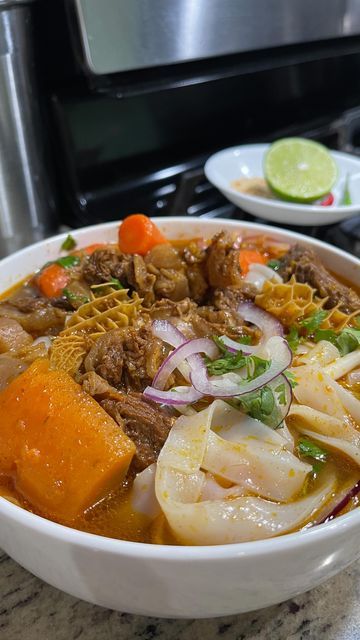 Joedy Tran on Instagram: "HỦ TIẾU BÒ KHO/VIETNAMESE BEEF STEw WITH FAT AZZ RICE NOODLES. Some of ya might say, “it’s not quick and simple”. Practice makes perfect heffaa! Get easier every time. Everyone has their own recipe and this is mine.  Recipe: 10-12 serving •12 cup water 💦  •(1 pk) 2oz bo kho seasoning (any brand) •3-4 lbs beef chuck roast (cut into cube) •2 lbs beef rough flank (cut)  •2-3 beef tendons (cut) •3 lbs carrot 🥕 •4 tablespoon minced garlic  •1/4 cup minced shallots  •(8-10) 5” lemon grass, lightly smashed  •1/4 cup cooking oil  •1/2 tablespoon ground pepper  •3 tablespoon fish sauce (3 crabs 🦀) •2 tablespoon salt  •1 tablespoon msg  •1.5 oz rock sugar  •1/2 cup ketchup   Marinate the chuck roast, flank and tendons with bo kho seasoning, ground pepper, 1 tablespoon of Bo Kho, Vietnamese Beef Stew, Vietnamese Beef, Rock Sugar, Beef Chuck Roast, Practice Makes Perfect, Beef Chuck, Chuck Roast, Ground Pepper