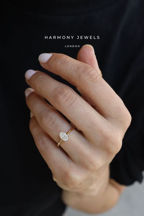 You're aware that if you say YES, you'll have a wedding to plan, aren't you? 👰🏽‍♀️ And this exquisite Oval Solitaire engagement ring will continuously remind you that it was a splendid decision to make! ✨💍 Small Round Engagement Rings, Simple Engagement Rings Solitaire, Small Oval Diamond Ring, Small Oval Cut Engagement Ring, Original Engagement Rings Unique, Dainty Solitaire Engagement Ring, Small Oval Ring, Simple Oval Wedding Rings, Traditional Engagement Rings Simple Gold