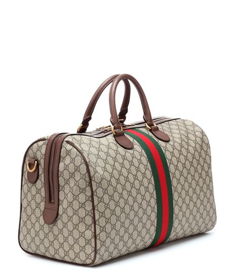 Ophidia Gg Travel Bag - Gucci | mytheresa Canvas Duffel Bag, Green Travel, Beige Brown, Duffel Bag, Leather Material, Louis Vuitton Damier, Antique Gold, Travel Bag, Travel Bags