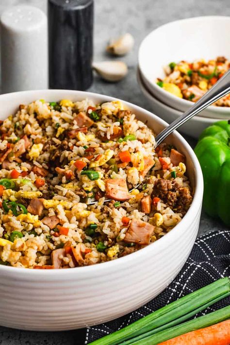 Start your day with this quick and healthy Breakfast Fried Rice! Packed with flavor, this high-protein meal prep option features Canadian bacon, sausage, veggies, and eggs combined with crispy fried rice. Perfect for a unique breakfast idea, whether cooked on a Blackstone or in a skillet. Includes tips for a vegetarian option. Click to get the full recipe and make mornings easier and delicious. High Protein Fried Rice, Protein Fried Rice, Eggs And Rice, Seasonal Meal Planning, Breakfast Fried Rice, Protein Egg, Unique Breakfast, Quick Easy Breakfast, Fried Breakfast