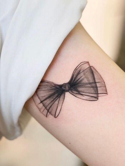 Ribbon Bow Tattoos For Women, Black Bow Tattoo For Women, Heart And Bow Tattoo, Bowtie Tattoos For Women, Bows Tattoos For Women Thighs, Ankle Bow Tattoo, Back Thigh Bow Tattoo, White Bow Tattoo, Lace Bow Tattoo Designs