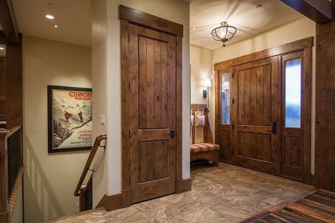 Barndominium Single Front Door, Rustic Doors Interior, Rustic Wood Doors, Mountain Home Interiors, House Transformation, Reclaimed Wood Floors, Timber Homes, Stained Doors, House Trim