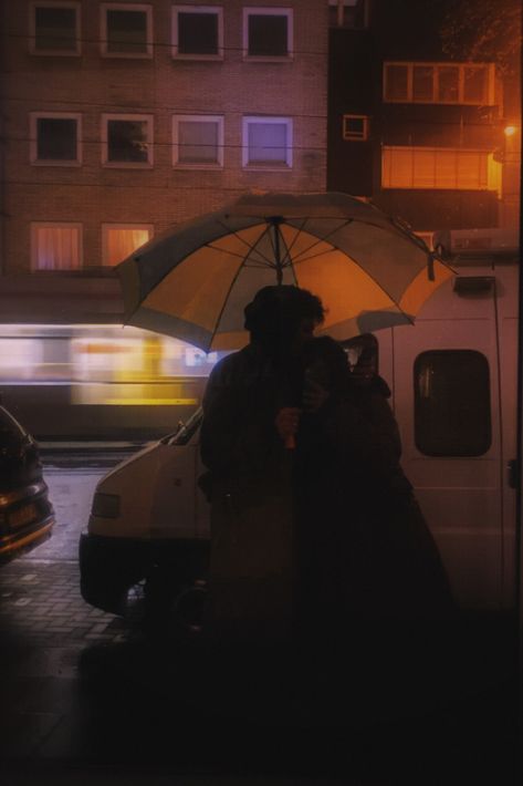 young couple in cologne with an umbrella in the rain Aesthetic Rain Couple, Couple Sharing Umbrella, Umbrella Couple Aesthetic, Couple With Umbrella In Rain, Couple Under Umbrella Aesthetic, Couple In Umbrella, Rain Couple Aesthetic, Couple In Rain Romantic, Sharing Umbrella