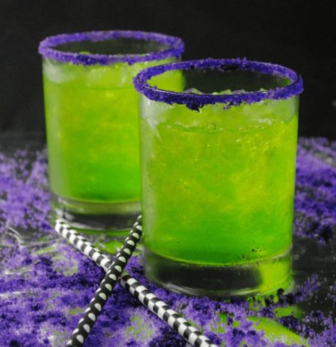 16 Purple, Green + Yellow Cocktails to Celebrate Mardi Gras | Brit + Co Vodka Based Cocktails, Mardi Gras Cocktails, Mardi Gras Drinks, Blueberry Vodka, Honey Simple Syrup, Der Joker, Alcholic Drinks, Pretty Cocktails, Lemon Drop Martini