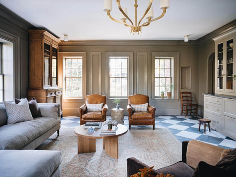 A Classic 1930s Home in Grand Rapids Designed by Jean Stoffer 2 Jean Stoffer Design Living Room, Stoffer Home Living Room, Jean Stoffer Living Room, Dark Blue Tile, Jean Stoffer Design, Jean Stoffer, Patina Farm, Large Chandelier, Natural Paper