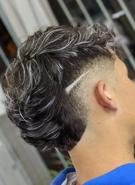 The mullet is a hairstyle that has been popular with men and women. A mullet is short in the front, sides, and back, with long hair on top. The mullet is a hairstyle that has been around for centuries. Mullet With Lines On Side Men, Short Top Mullet Mens, Edgar Mullets, Mullet With Design Men, Side Fade Mullet, Mullet Design Men, Mullet Burst Fade Men, High Taper Mullet, Edgar Mullet Haircut