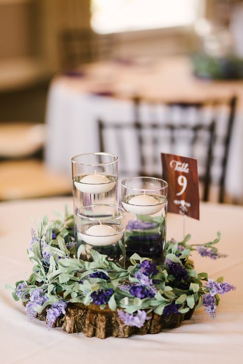 Candle Flowers Centerpieces, Lavender And Greenery Wedding Decor, Lavender And Dark Purple Wedding, Dusty Purple Wedding Table Decor, Dusty Purple Wedding Centerpieces, Purple Farmhouse Wedding, Lavender Wedding Centerpiece, Rustic Wedding Decor Lavender, Purple Wedding Reception Decorations Wedding Table Decor