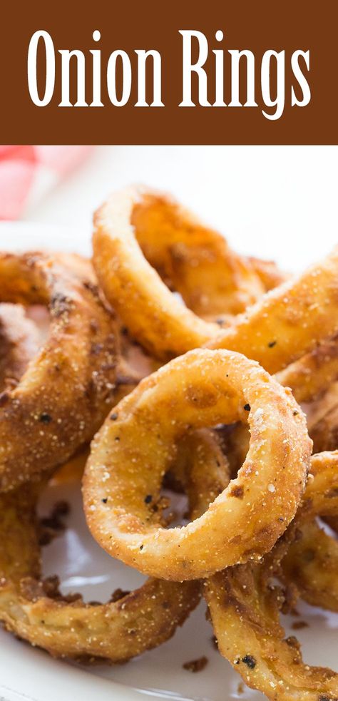 Crunchy onion rings! Onion rings, soaked in buttermilk, coated with flour and cornmeal, and deep fried to a golden crisp. On SimplyRecipes.com Homemade Onion Rings, Sliced Onion, Homemade Buttermilk, Crispy Onions, Think Food, Corn Dogs, Onion Rings, 1 Egg, Corn Starch