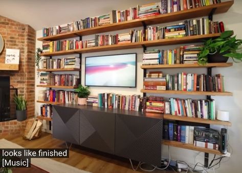 I really like what the DIY Wife on Youtube created for her friend's living room. Thinking of doing this for my son's room. Tv In Bookshelf Next To Fireplace, Tv In Front Of Bookshelves, Bookshelves Above Tv, Diy Bookshelf Tv Wall, Bookcase Tv Wall Living Room, Tv And Bookshelf Wall Living Room, Book Shelf Tv Wall, Wall Book Shelf Ideas Living Room, Book Shelf With Tv