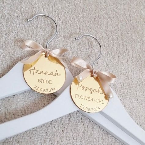 Name hangers are not only perfect for your wedding party attire but as a keepsake for after your wedding day for every special human involved. Description Personalised mirror tags place name etched in mirror acrylic. Choose your favourite colour and let us know the text. Each will have a hole to tie ribbon or twine. The diameter is 6cm. Styling and text may vary to keep up with current trends. Processing time Order processing time is currently 5-15 working days however there is an option for urg Personalised Mirror, Wedding Coat Hangers, Affordable Wedding Centerpieces, Wedding Party Attire, Bridal Party Hangers, Resin Necklaces, Name Hangers, First Communion Decorations, Wedding Acrylic