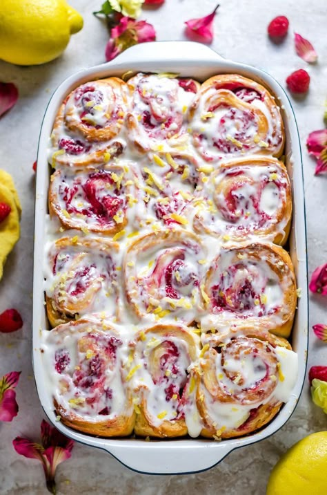 Overnight Raspberry Sweet Rolls with Lemon Cream Cheese Glaze. A brunch-lover's dream. | http://hostthetoast.com Raspberry Sweet Rolls, Lemon Cream Cheese, Cream Cheese Glaze, Raspberry Filling, Lemon Glaze, Hosting Guests, Lemon Cream, Sweet Rolls, Brunch Recipes