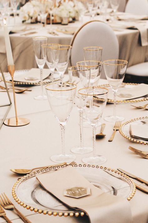 Golden Cutlery Table Setting, Gold Cutlery Wedding Place Settings, Clear Gold Beaded Chargers Wedding, Gold Chargers Wedding Place Settings Round Table, Champagne Charger Plates, White And Gold Dinner Table Setting, Wedding Table Glassware, Gold Beaded Charger Plates Wedding, Gold Silverware Table Setting