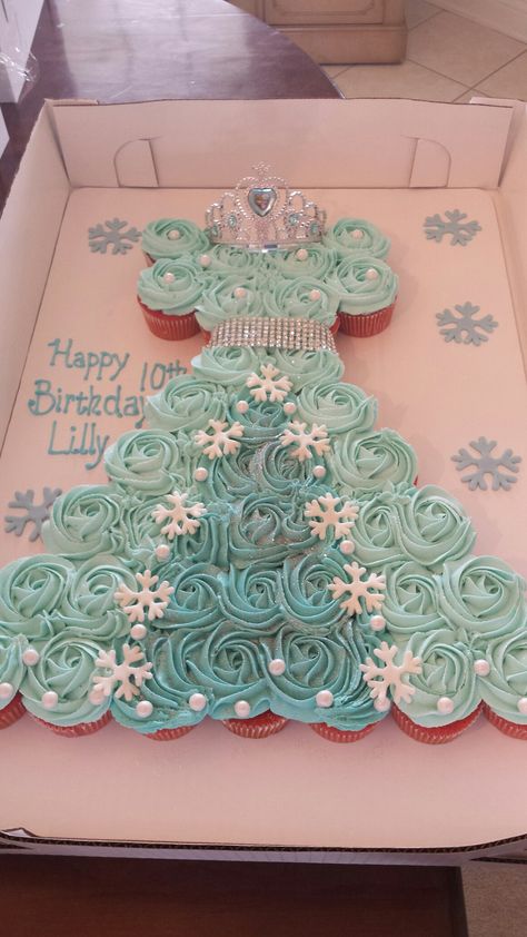 Frozen cupcake dress cake Elsa Dress Cupcake Cake, Frozen Pull Apart Cupcake Cake, Princess Birthday Cupcake Cake, Princess Cupcake Cake Ideas, Frozen Dress Cake, Elsa Birthday Cupcake Cake, Princess Dress Cupcake Cake, Frozen Birthday Cupcakes Ideas, Elsa Cupcake Cake Pull Apart