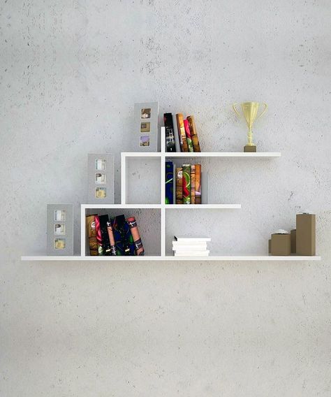 With the increasing digitization of literature, the need for space-consuming bookcases has diminished. It is indeed, not difficult to conceive of a future where Bookshelf Woodworking Plans, Wall Rack Design, Diy Bookshelf Design, Ikea Wall Shelves, Minimalist Bookshelves, Unique Wall Shelves, Small Wall Shelf, Unique Bookshelves, Creative Bookshelves