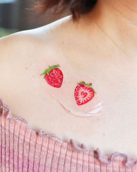 Strawberry Shoulder Tattoo Strawberry Jam Tattoo, Tiny Strawberry Tattoo, Cute Strawberry Tattoo, Small Strawberry Tattoo, Strawberry Tattoo Minimalist, Strawberry Tattoo Ideas, Cutesy Tattoos, Strawberry Tattoos, Seed Tattoo