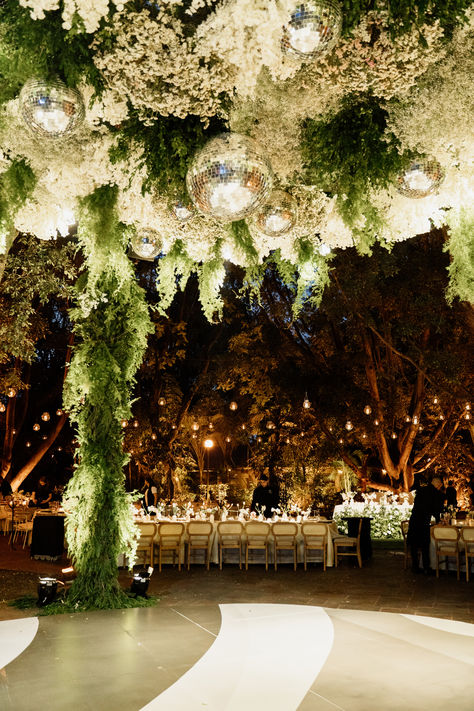 disco balls and grenery wedding trends Disco Balls And Chandeliers Wedding, 2026 Wedding Trends, Jungle Disco Wedding, Disco Balls Wedding, Hanging Wedding Flowers, Disco Ball Wedding Decor, Wedding Disco Ball, Disco Ball Wedding, Wedding Disco