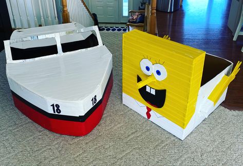 Made with cardboard and duct tape only! Cardboard Sled Ideas Diy, Cardboard Sled, Boat Box Cardboard, Cardboard Box Sailboat, Cardboard Boat Race Design, Cardboard Boat Regatta, Cardboard And Duct Tape Boat, Cardboard Box Boats, Cardboard Boat Race