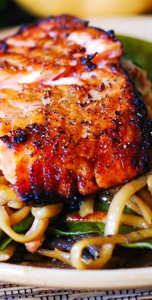 Asian Salmon with Noodles, Mushrooms, and Snow Peas make an excellent weeknight dinner choice.  Easy to make and they will bring a variety to your weekly rotation of recipes.  Honey-soy salmon broiled to perfection and then tossed with flavorful Asian noodles with mushrooms and snow peas. Both salmon and noodles are smothered in Sriracha flavored, honey-sesame sauce. #salmon #fish #Asian #Asiansalmon #noodles #mushrooms Easy Delicious Asian Recipes, Salmon And Noodles, Noodles Mushrooms, Gf Noodles, Noodles With Mushrooms, Asian Salmon Recipes, Salmon Noodles, Asian Salmon, Fish Dinner Recipes