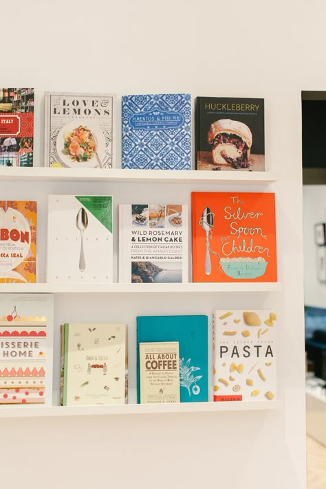 Cook Books On Kitchen Counter, Floating Shelves Cookbooks, Floating Shelf Cookbooks, Cookbooks Above Cabinets, Cookbook Wall Display, Picture Ledge Kitchen, Cookbook Display In Kitchen, Cook Book Display Ideas, Cookbook Styling