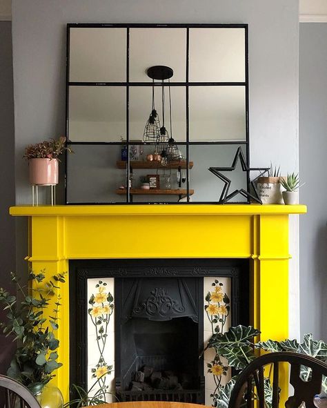 Yellow fireplace, colourful fireplace, colourful home, yellow mantle, coloured fireplace, industrial mirror Colorful Fireplace, Yellow Fireplace, Minimalist Fireplace, Faux Fireplace Mantels, Moody Living Room, Monochromatic Room, I Have An Idea, Fireplace Designs, Vintage Fireplace