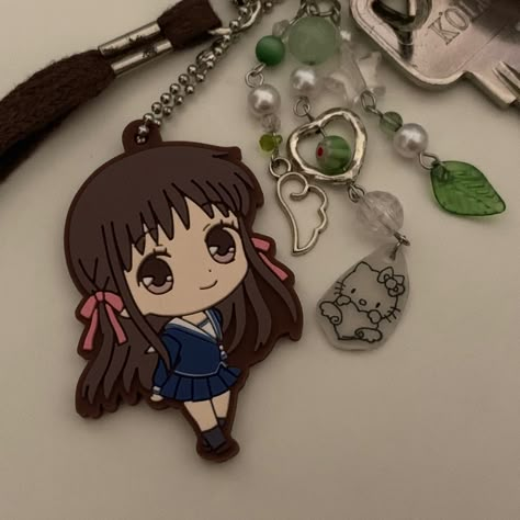 tohru from fruit basket :) 🍙 Fruits Basket Keychain, Kyo Sohma Bracelet, Fruits Basket Merch, Tohru Aesthetic, Tohru Pfp, Fruits Basket X Hello Kitty, Fruit Basket Anime, Green Keychain, Tohru Honda