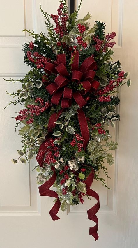 Decorate a classic evergreen tree with ornaments, tinsel, and a tree topper like a star or angel. Indoor Christmas Wreath Ideas, Velvet Bow Christmas, Frosted Berries, Holiday Landscape, Poinsettia Decor, Floral Swags, Diy Floral Wreath, Holiday Swag, Winter Greenery