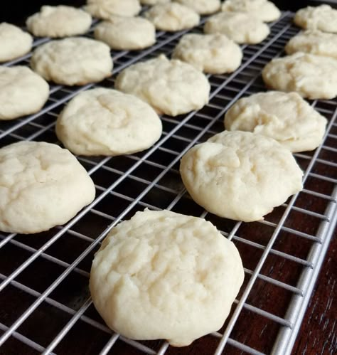 soft sour cream cookies on cooling rack Cookie Recipes With Sour Cream, Soft Sour Cream Cookies, Amish Sour Cream Cookies, Sour Cream Cookies Soft, Sour Cream Drop Cookies, Cookies With Sour Cream In Them, Sour Cream Chocolate Chip Cookies, Soft Sour Cream Sugar Cookies, Sour Cream Cookies Old Fashioned