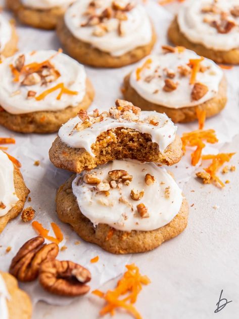 carrot cake cookie with a bite leaning on top of another cookie. Carrot Cake Stuffed Cookies, Carrot Cake Cookie, Zucchini Chocolate Chip Cookies, Coffee Cake Cookies, Cookies With Cream Cheese Frosting, Cookies With Cream Cheese, Fresh Carrots, Easy Carrot Cake, Carrot Cake Cookies