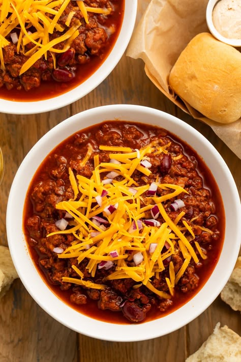 Is it just us or does Texas Roadhouse have the BEST chili?! Skip the line and make a big batch at home with this Texas Roadhouse chili copycat recipe! Super savory, filling, and just perfectly spiced, make sure you top your bowl with shredded cheddar and chopped red onions… but don’t forget the rolls! Chili Recipe Texas Roadhouse, Texas Roadhouse Chili Copycat, Best Red Chili Recipe, Texas Roadhouse Chili Recipe No Beans, Texas Roadhouse Chilli, Copycat Texas Roadhouse Chili Recipe, Outback Chili Recipe, Copycat Runza Chili Recipe, Costco Chili Copycat Recipe