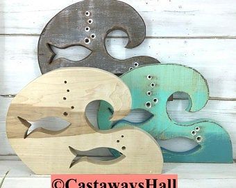 Castaways Hall | Etsy Coastal Towels, Lake Cottage Decor, Painted Paddles, Wood School, Whale Wall Art, Wooden Whale, Crab Art, Beach House Wall Decor, School Of Fish