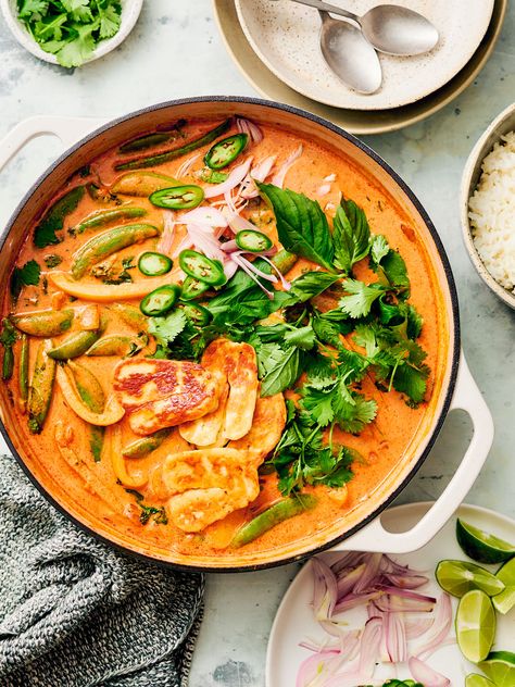 This easy Halloumi Curry is made with creamy coconut milk, crisp veggies, and flavorful Thai red curry paste. A quick, flavor-packed weeknight dinner. Serve this delicious vegetarian main with rice, fresh herbs, and lime. (Vegetarian, Gluten Free) Halloumi Curry Recipe, Vegan Pad Thai Sauce, Halloumi Curry, Air Fryer Cabbage, Vegan Tom Yum Soup, Fryer Cabbage, Vegan Tom Yum, Halloumi Recipes, Evergreen Kitchen