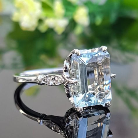 Emerald cut aquamarine ring