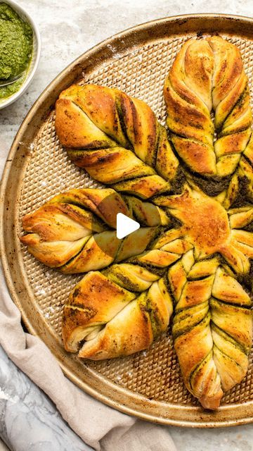 37K views · 4.6K likes | From My Bowl | by Caitlin S on Instagram: "Looking for an easy holiday app? This 3-INGREDIENT PESTO STAR BREAD is always a hit 😋🌟💚

Layers of savory, herb-y pesto are sandwiched between fluffy, chewy dough that makes this recipe reminiscent of pull-apart bread, but way easier to make I like to buy store-bought pesto and pizza dough (I get mine from @traderjoes) 

You can also customize this recipe by swapping the pesto for a different sauce (sweet or savory!) Get all the details on From My Bowl and follow @frommybowl for more simple and seasonal plant-based eats 💫" Star Bread, Savory Herb, Pull Apart Bread, Plant Based Eating, Simple Holidays, Pull Apart, 3 Ingredient, Pizza Dough, 3 Ingredients