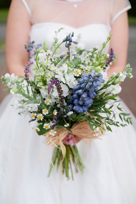 Go for a picked-from-the-garden vibe by choosing a bouquet of small blooms like Ivison did here. Delphinium that hadn't quite opened yet was the perfect finishing touch. 2025 Design, Bouquet Of Wildflowers, Bouquet Champetre, Bouquet Bride, Natural Flowers, Wedding 2025, Wildflower Bouquet, Wildflower Wedding, Bouquet Of Flowers