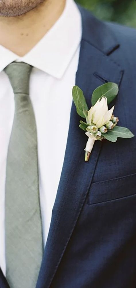 Navy Suit Sage Tie Wedding, Navy Suit Sage Tie, Navy Blue And Sage Green Wedding, Outdoor Wedding Casual, Greenery Boutonniere, Blue Groomsmen Suits, Casual Outdoor Wedding, Boutonniere White, Sage Green Bridesmaid Dresses